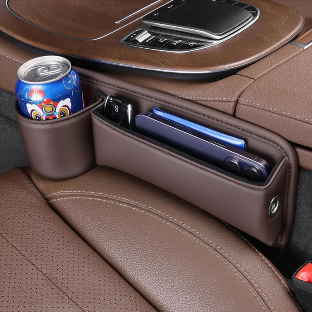 Seat gap storage box in brown leather installed in car interior