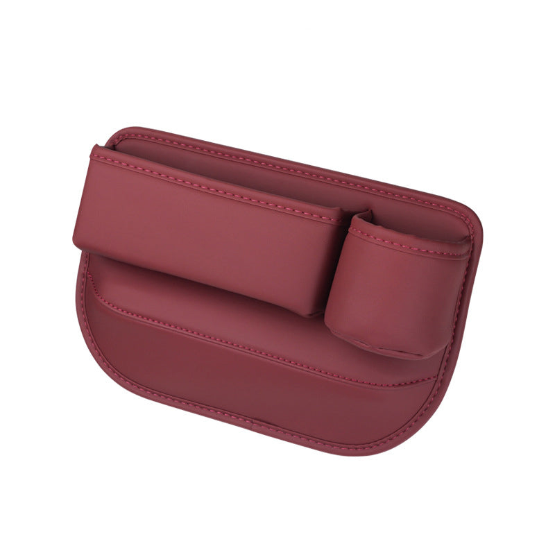 Seat gap organizer in red, right-facing studio view